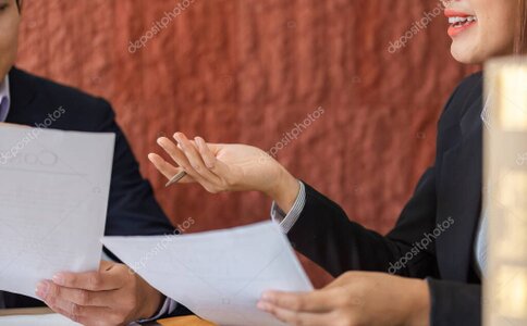 Attorney reviewing USDA investigative documents with retailer